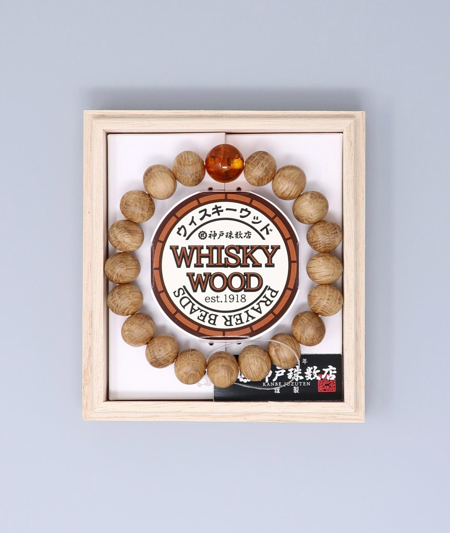 Men's Whiskey Barrel Wood Amber Bracelet made from reclaimed whiskey barrel wood with compressed amber accents, handcrafted in Japan Kanbe Juzu, ideal for amulet, yoga, meditation, prayer, or gifting.