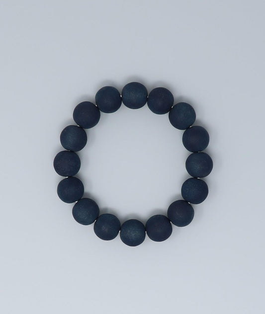 Men's indigo pearl bracelet made from mountain cherry wood, handcrafted in Japan using traditional Sho-Aizome indigo dyeing by Kanbe Juzu of Kyoto; spiritual accessory inspired by samurai, ideal for yoga, prayer, or as a premium gift.