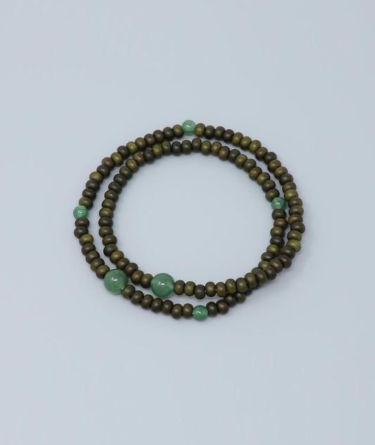 Unisex Green Sandalwood Life Tree 108-bead bracelet with jade accents, handcrafted protective amulet symbolizing success and calm. Handcrafted in Japan Kanbe Juzu, ideal for amulet, yoga, meditation, prayer, or gifting.