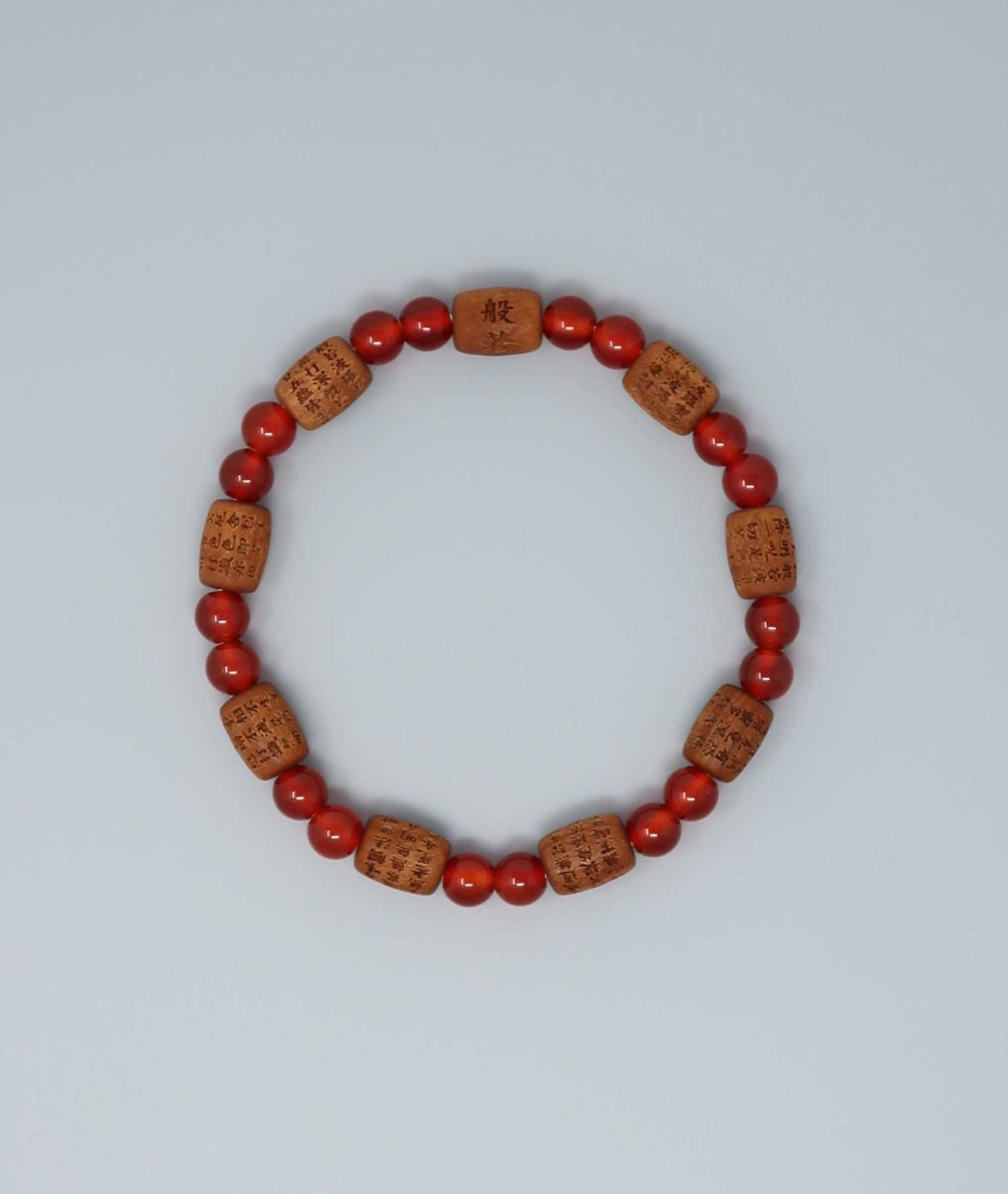 Sandalwood bracelet engraved with the Heart Sutra and accented with a Agate bead—handcrafted for spiritual protection and harmony. Handcrafted in Kyoto Japan Kanbe Juzu, ideal for amulet, yoga, meditation, prayer, or gifting.