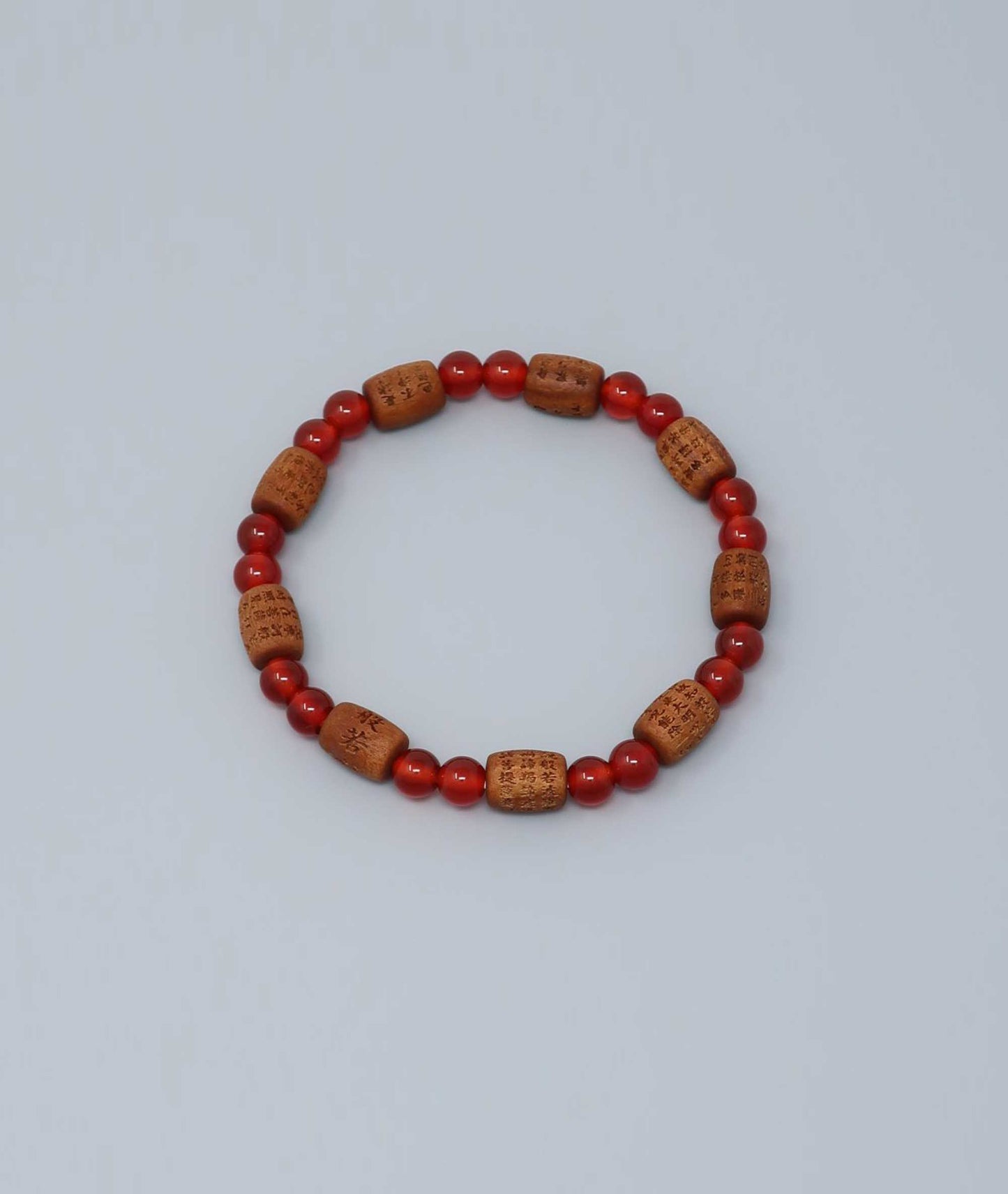 Sandalwood bracelet engraved with the Heart Sutra and accented with a Agate bead—handcrafted for spiritual protection and harmony. Handcrafted in Kyoto Japan Kanbe Juzu, ideal for amulet, yoga, meditation, prayer, or gifting.