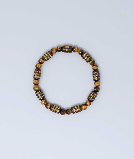 Striped ebony bracelet with Heart Sutra engraving and Tiger’s Eye beads, handmade for spiritual protection and strength. Handcrafted in Kyoto Japan Kanbe Juzu