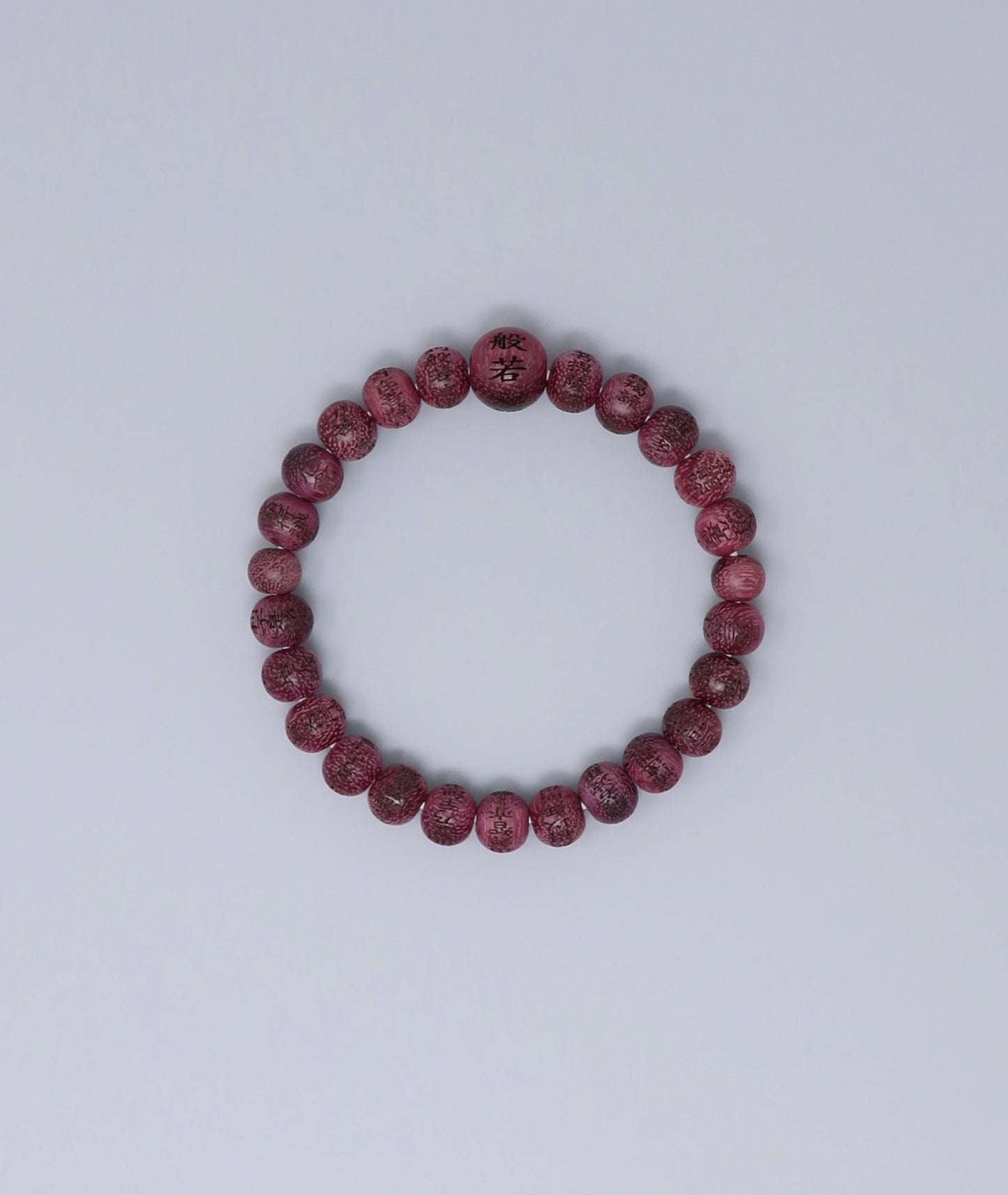 Unisex Buddhist prayer bracelet made from Purpleheart wood, engraved with the full Heart Sutra – a handmade spiritual mala for meditation, protection, and mindfulness. Handcrafted in Japan Kanbe Juzu, ideal for amulet, yoga, meditation, prayer, or gifting.
