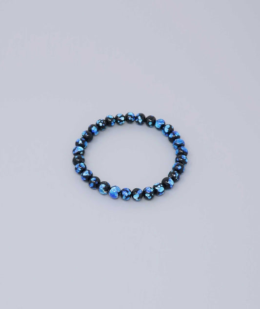 Elegant Blue Ryukyu fluorite bracelet with shimmering light blue accents on a jet-black base. Handmade by artisans, combining mystique and luxury. Handcrafted in Japan Kanbe Juzu, ideal for amulet, yoga, meditation, prayer, or gifting.