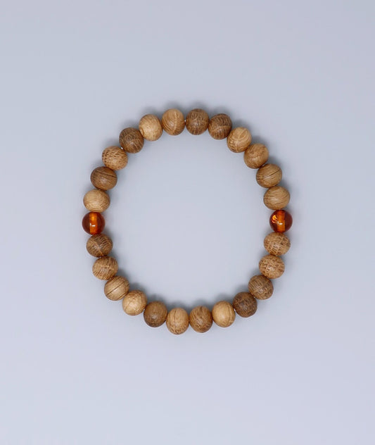 All gender Whiskey Barrel Wood Amber Bracelet made from reclaimed whiskey barrel wood with compressed amber accents, handcrafted in Japan Kanbe Juzu, ideal for amulet, yoga, meditation, prayer, or gifting.