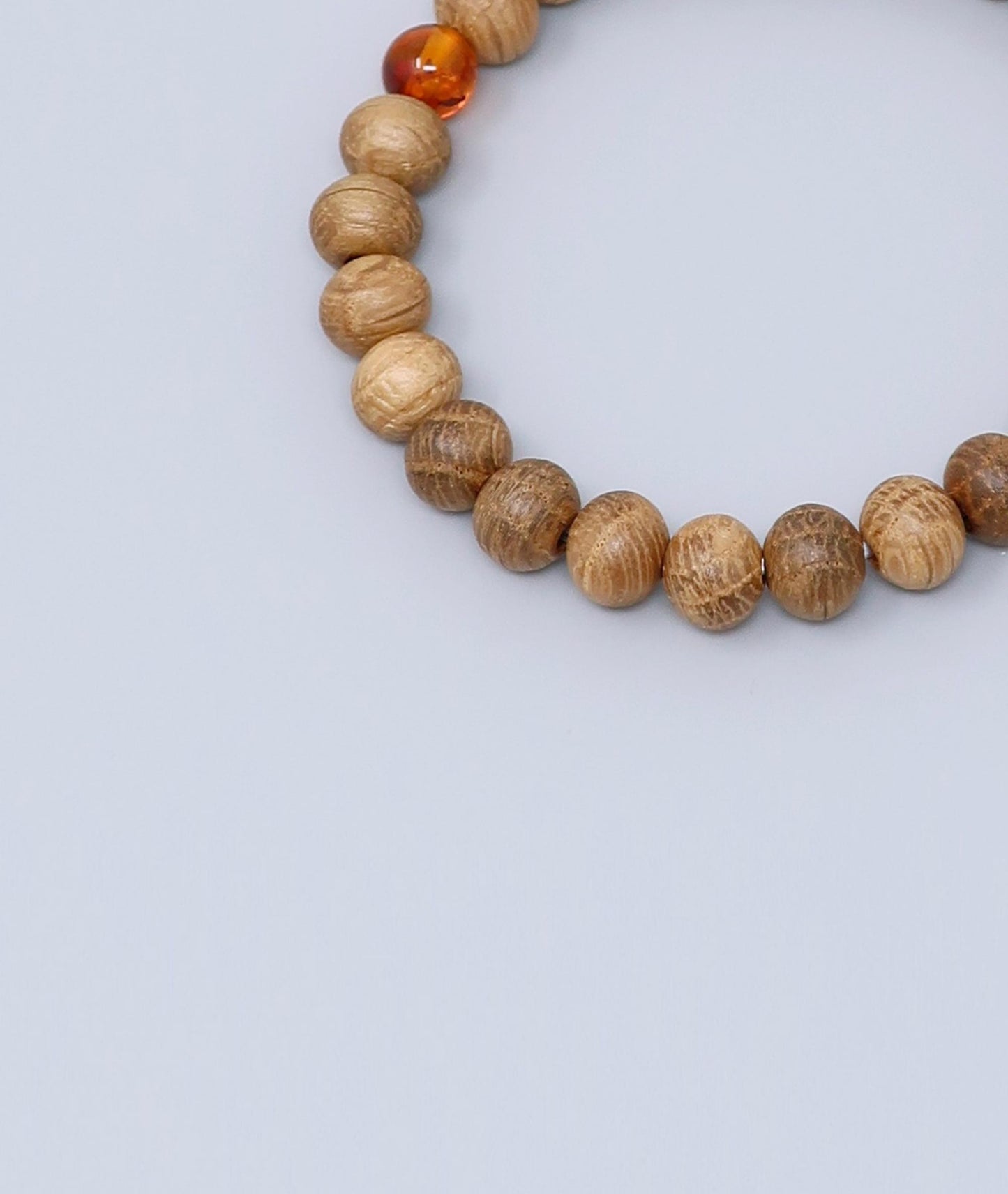 All gender Whiskey Barrel Wood Amber Bracelet made from reclaimed whiskey barrel wood with compressed amber accents, handcrafted in Japan Kanbe Juzu, ideal for amulet, yoga, meditation, prayer, or gifting.