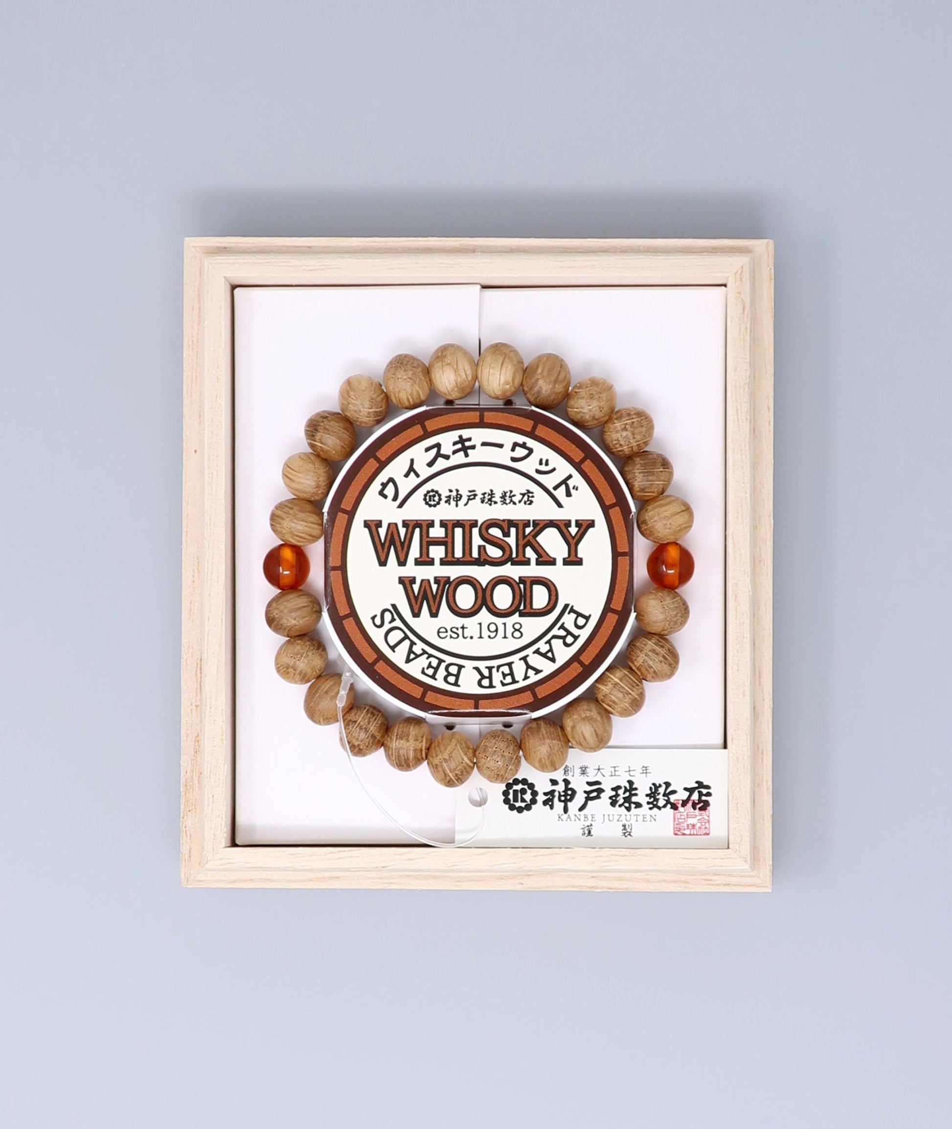 All gender Whiskey Barrel Wood Amber Bracelet made from reclaimed whiskey barrel wood with compressed amber accents, handcrafted in Japan Kanbe Juzu, ideal for amulet, yoga, meditation, prayer, or gifting.