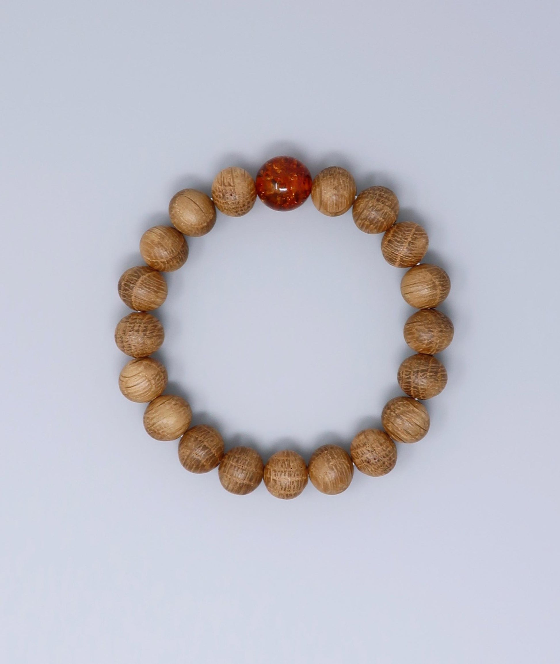 Men's Whiskey Barrel Wood Amber Bracelet made from reclaimed whiskey barrel wood with compressed amber accents, handcrafted in Japan Kanbe Juzu, ideal for amulet, yoga, meditation, prayer, or gifting.