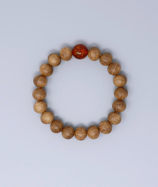 Men's Whiskey Barrel Wood Amber Bracelet made from reclaimed whiskey barrel wood with compressed amber accents, handcrafted in Japan Kanbe Juzu, ideal for amulet, yoga, meditation, prayer, or gifting.
