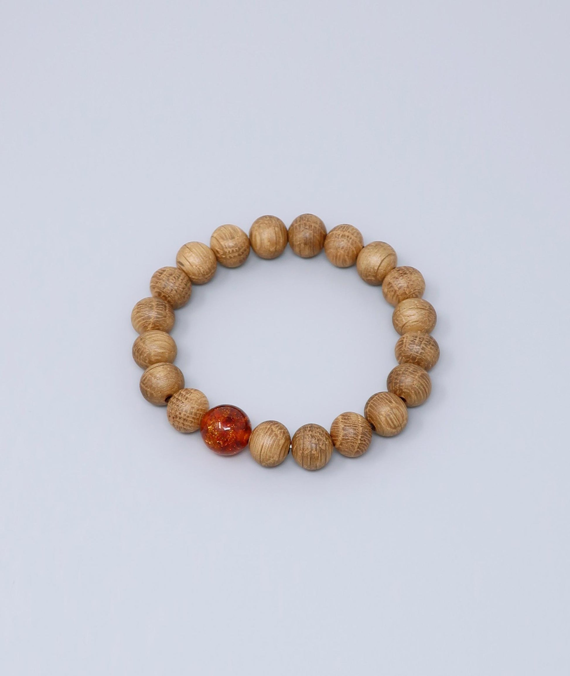 Men's Whiskey Barrel Wood Amber Bracelet made from reclaimed whiskey barrel wood with compressed amber accents, handcrafted in Japan Kanbe Juzu, ideal for amulet, yoga, meditation, prayer, or gifting.