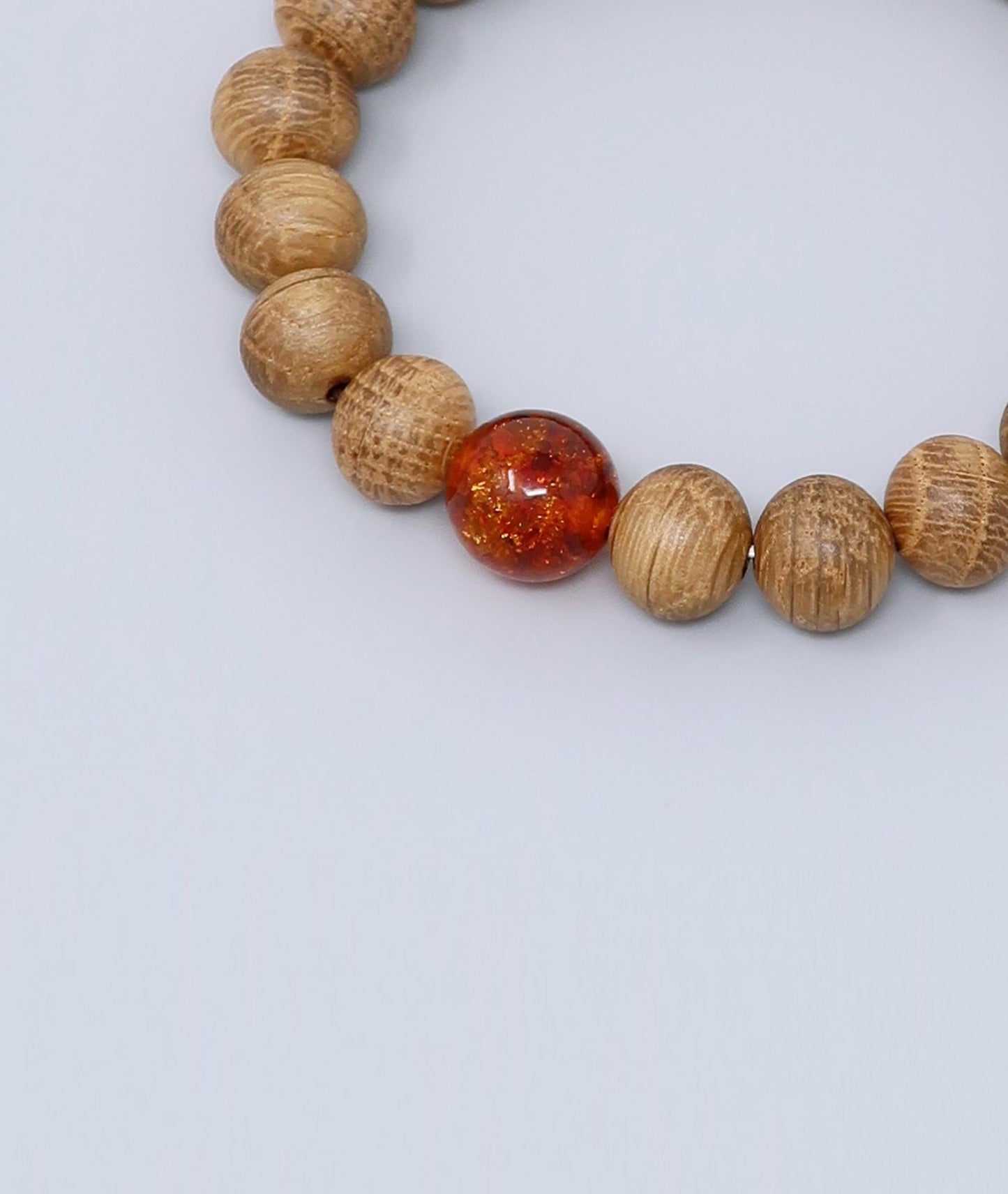 Men's Whiskey Barrel Wood Amber Bracelet made from reclaimed whiskey barrel wood with compressed amber accents, handcrafted in Japan Kanbe Juzu, ideal for amulet, yoga, meditation, prayer, or gifting.