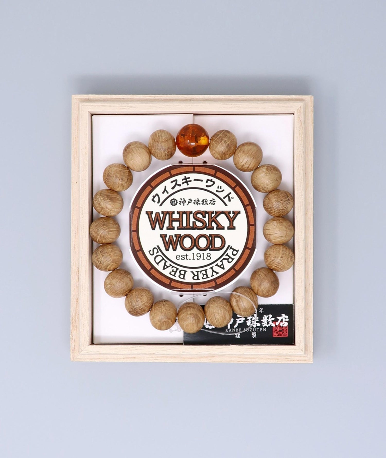 Men's Whiskey Barrel Wood Amber Bracelet made from reclaimed whiskey barrel wood with compressed amber accents, handcrafted in Japan Kanbe Juzu, ideal for amulet, yoga, meditation, prayer, or gifting.